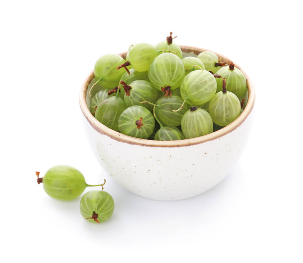 Bowl with fresh ripe gooseberry on white background - Photo, Image