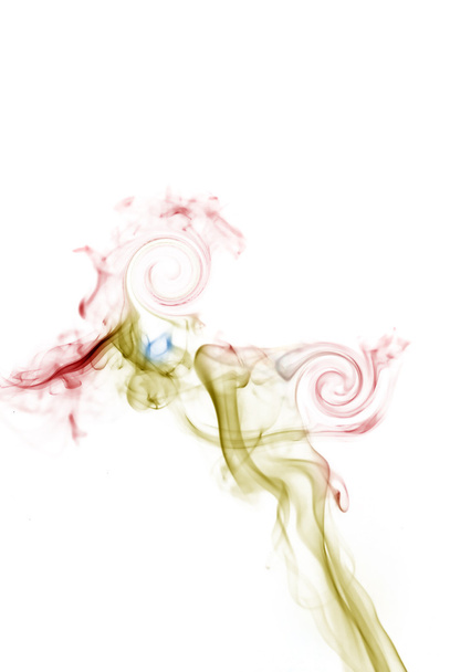 Colorful smoke on white background in form of woman's silhouette - Photo, Image