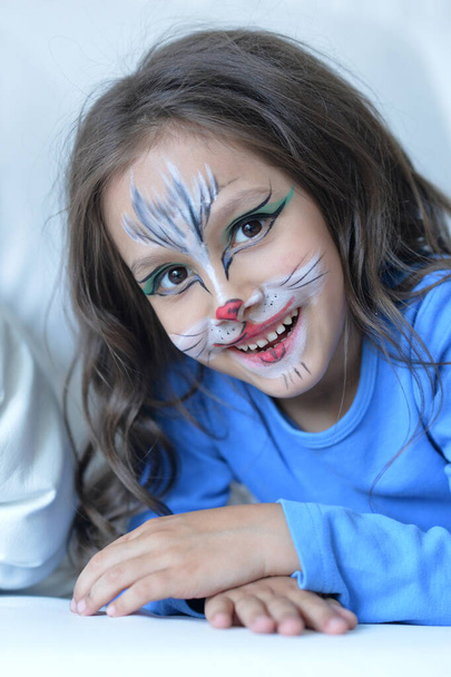 Little girl with face painted as rabbit  - Foto, imagen