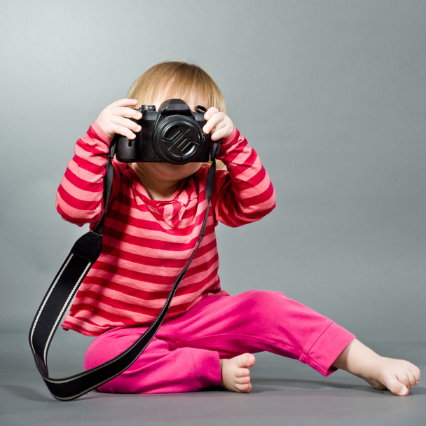 Cute little baby with digital photo camera - Foto, Imagen