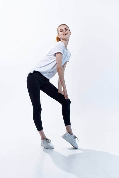 woman in sports uniform posing fitness cardio light background - Fotografie, Obrázek