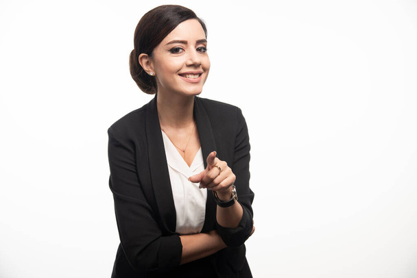 Business woman posing in suit on a white background. High quality photo - Φωτογραφία, εικόνα