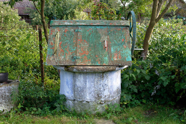 Green well with metal coating - Photo, Image
