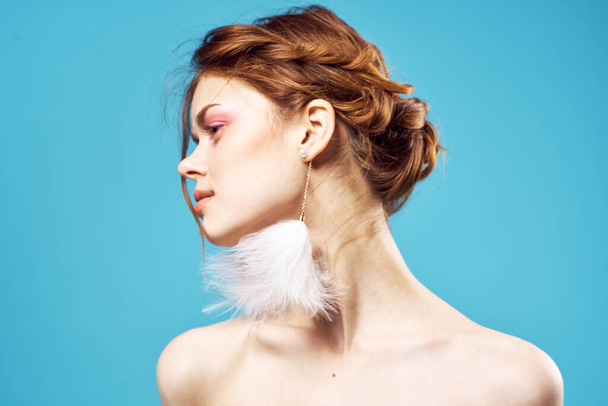 cheerful woman bare shoulders fluffy earrings charm fashion close-up - Фото, изображение