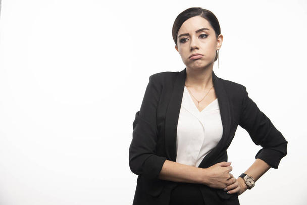 Business woman posing in suit on a white background. High quality photo - Foto, Imagem