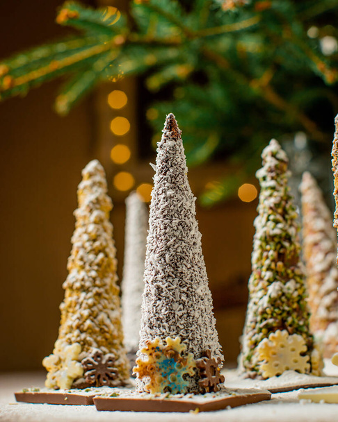 A selective closeup of anthill cakes on a Christmas table - Фото, зображення