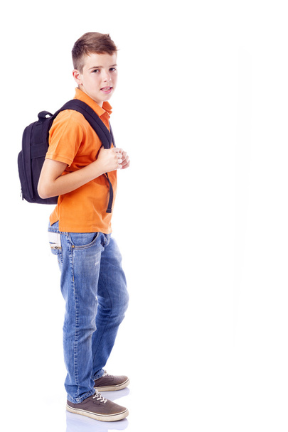 Full body portrait of a smiling school boy with backpack, isolat - 写真・画像