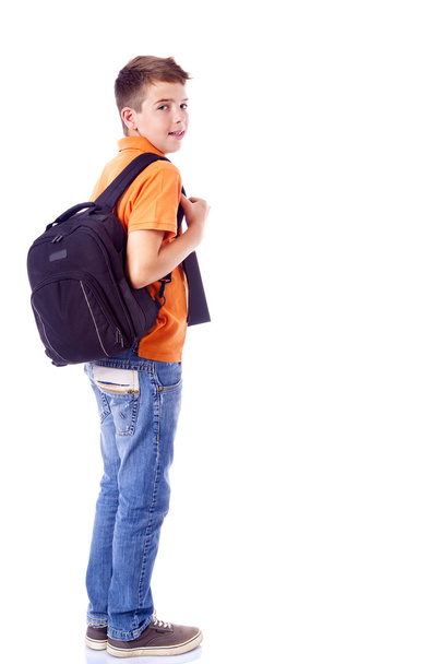 Full body portrait of a smiling school boy with backpack, isolat - Photo, image