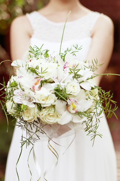 Bride holding bridal bouquet - Photo, Image