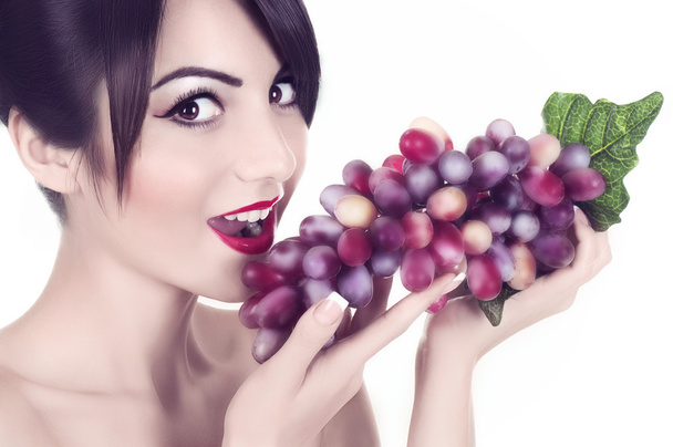 Woman with red grape - Photo, Image