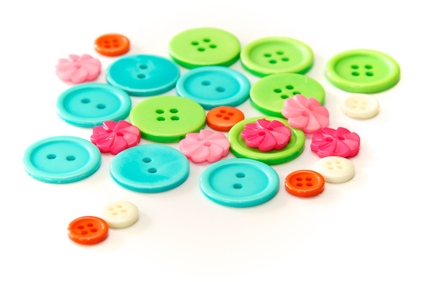 botões coloridos variados sobre branco
 - Foto, Imagem