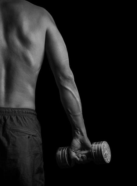 Fitness man with dumbbell - Foto, imagen