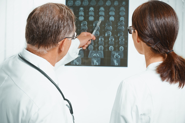 Doctors examine MRI image - Фото, изображение
