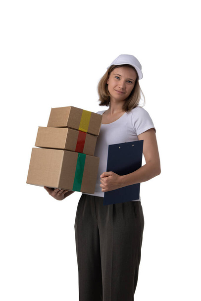 Young girl with cardboard boxes and document folder in hand isolated on white background - Foto, Bild