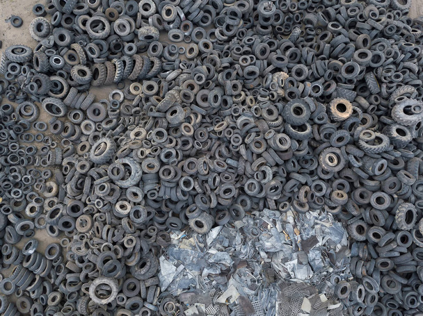 Close-up view from a drone on a large number of old, used tires - Photo, Image