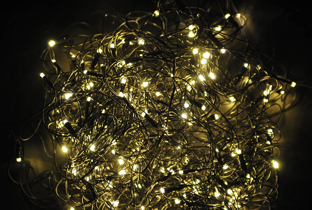 Defocused  festive christmas background. Golden chrismas light.  - Foto, imagen