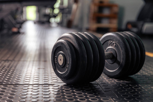 The dumbbell lies on the floor. Gym. Training - Photo, Image