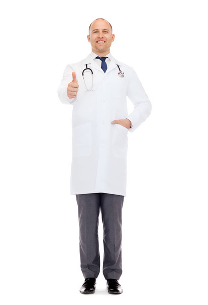 smiling doctor with stethoscope showing thumbs up - Foto, immagini