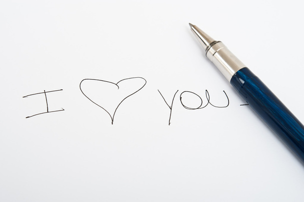 あなたのメッセージをペンで書きます。「愛してください」ブルー電子ペンで書く. - 写真・画像