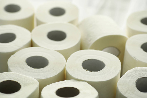 Toilet paper in a roll. Snow-white soft three-layer toilet paper. Lack hygiene products. Primary protection and disinfection. - Foto, Imagem