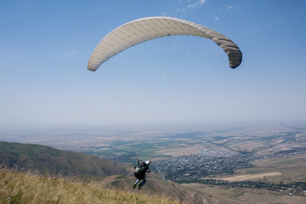 People are going to their first flight on a paraglider - Photo, Image