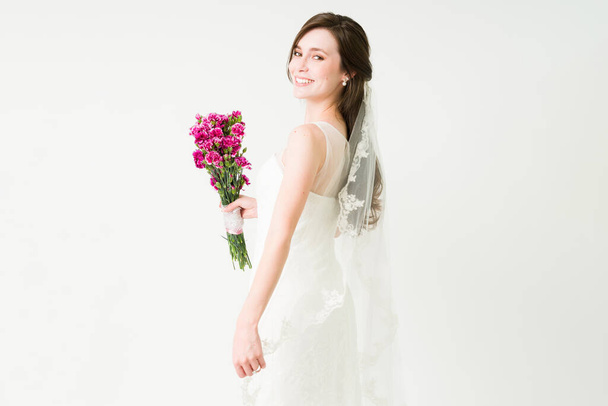 I'm getting married! Cheerful gorgeous attractive happy on her wedding day - Фото, изображение