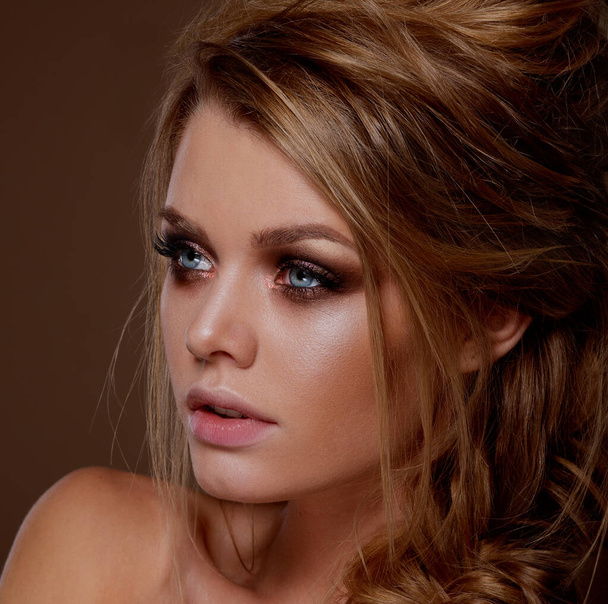 Face close-up. Female portrait. Professional evening make-up. Cosmetics. - Photo, Image