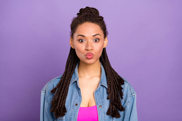 Portrait of attractive funny girlish girl sending air kiss affection isolated over bright purple violet red color background - Zdjęcie, obraz