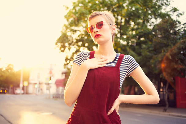pretty woman wearing sunglasses outdoors lifestyle fashion posing - Photo, Image