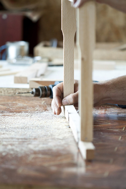 Man's arms drill lath in the workshop - Zdjęcie, obraz