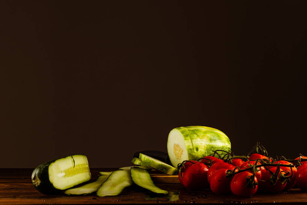 A closeup shot of cutting fresh vegetables - Photo, Image