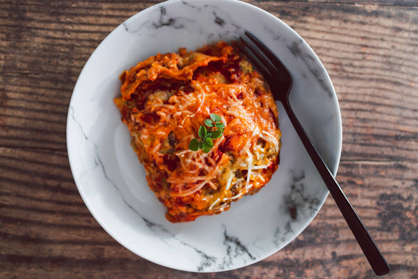 vegan lasagne with lentil bolognese sauce and homemade dairy free bechamel sauce, healthy plant-based food recipes - Fotó, kép