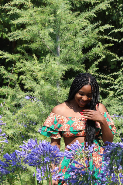 Photo of a Beautiful Black Lady in a park - Foto, Bild