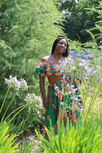 Photo of a Beautiful Black Lady in a park - Zdjęcie, obraz