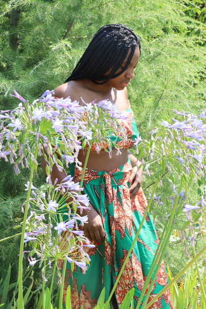 Photo of a Beautiful Black Lady in a park - Photo, Image