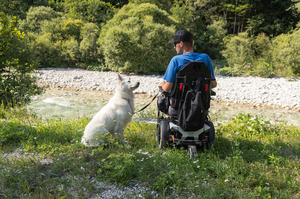 Disabled man with his dog - Foto, Imagen