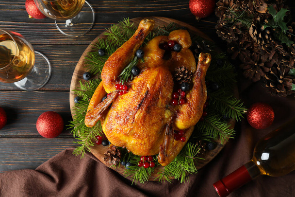 Concept of Christmas roast turkey on wooden table - Photo, Image