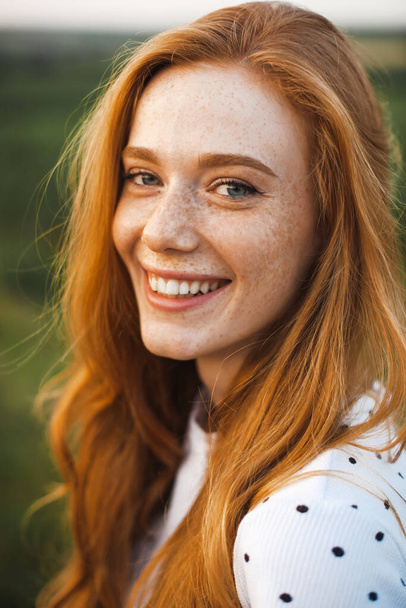 Beautiful red haired woman with freckles. Pretty young woman. Luxury travel. Beauty face. - Photo, Image