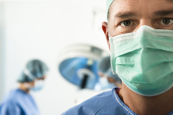 Portrait of a Male Surgeon At Work - Photo, image
