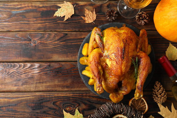 Thanksgiving Day roast turkey on wooden table - 写真・画像
