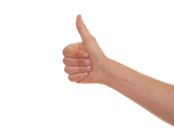 Male hand gesturing thumb up - Photo, Image