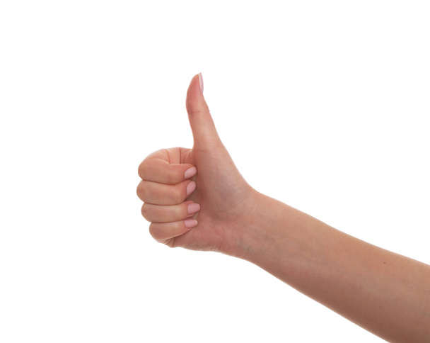 Female hand gesturing thumb up - Foto, Bild