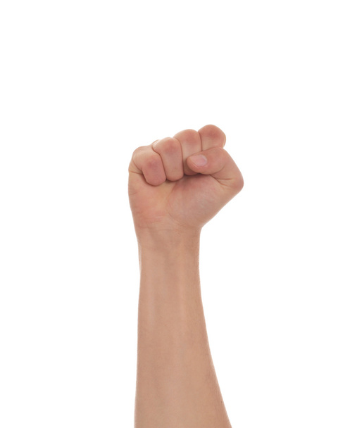 Raised male fist - Фото, изображение