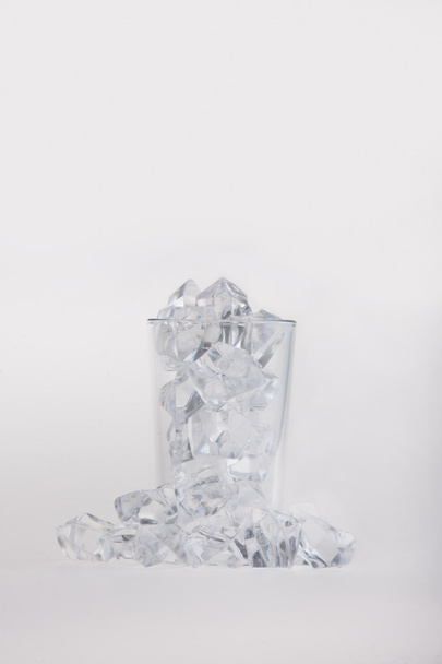 Empty glass filled with ice cubes - Fotoğraf, Görsel
