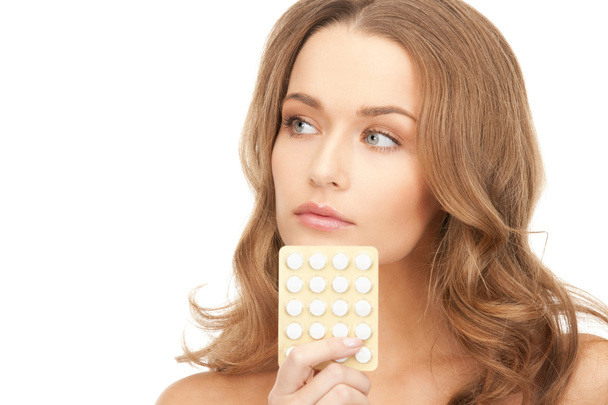 Picture of young beautiful woman with pills - Foto, Imagem