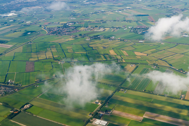 Aerial view from plane to Holland. Flight from Helsinki to Amsterdam. - Photo, Image