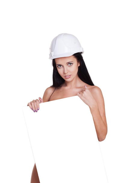 Nude sexy girl with white tablet. in the helmet - Foto, imagen