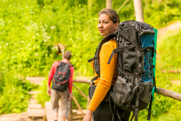 young couple in summer hike with backpacks - Photo, Image