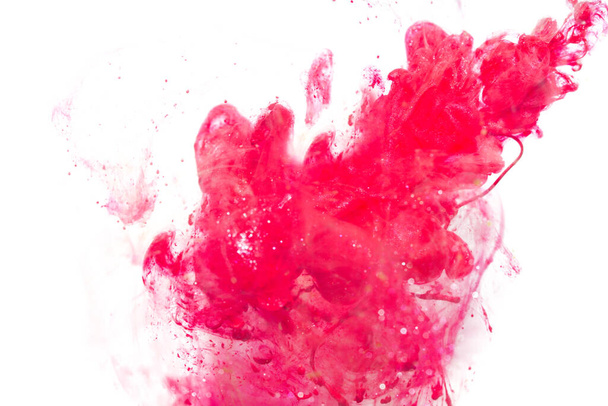 pintar en agua. explosiones de tinta en agua pintura roja - Foto, imagen