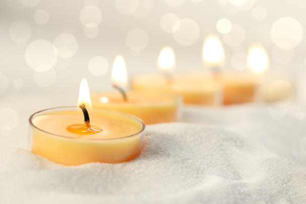 Votive candles in sand - Photo, Image